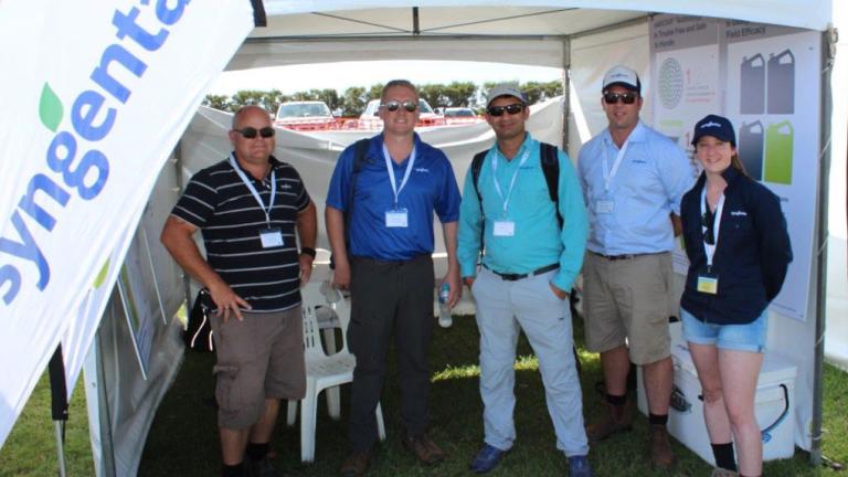 people in syngenta booth