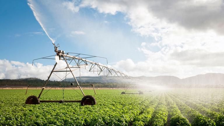 spray machines spraying crops 
