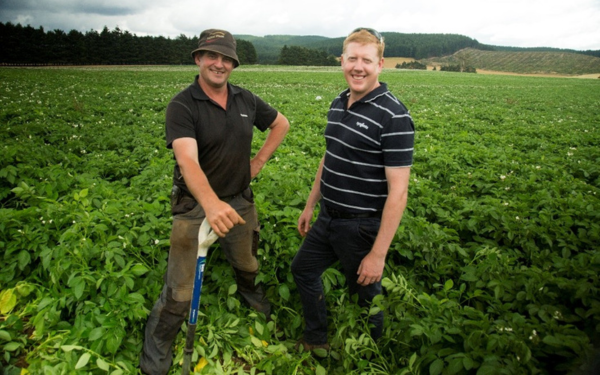 John Cresswell of Ringarooma, Tas, with Syngenta Territory Sales Manager, Wayne Richardson, mid-season, checking how the crop is progressing.